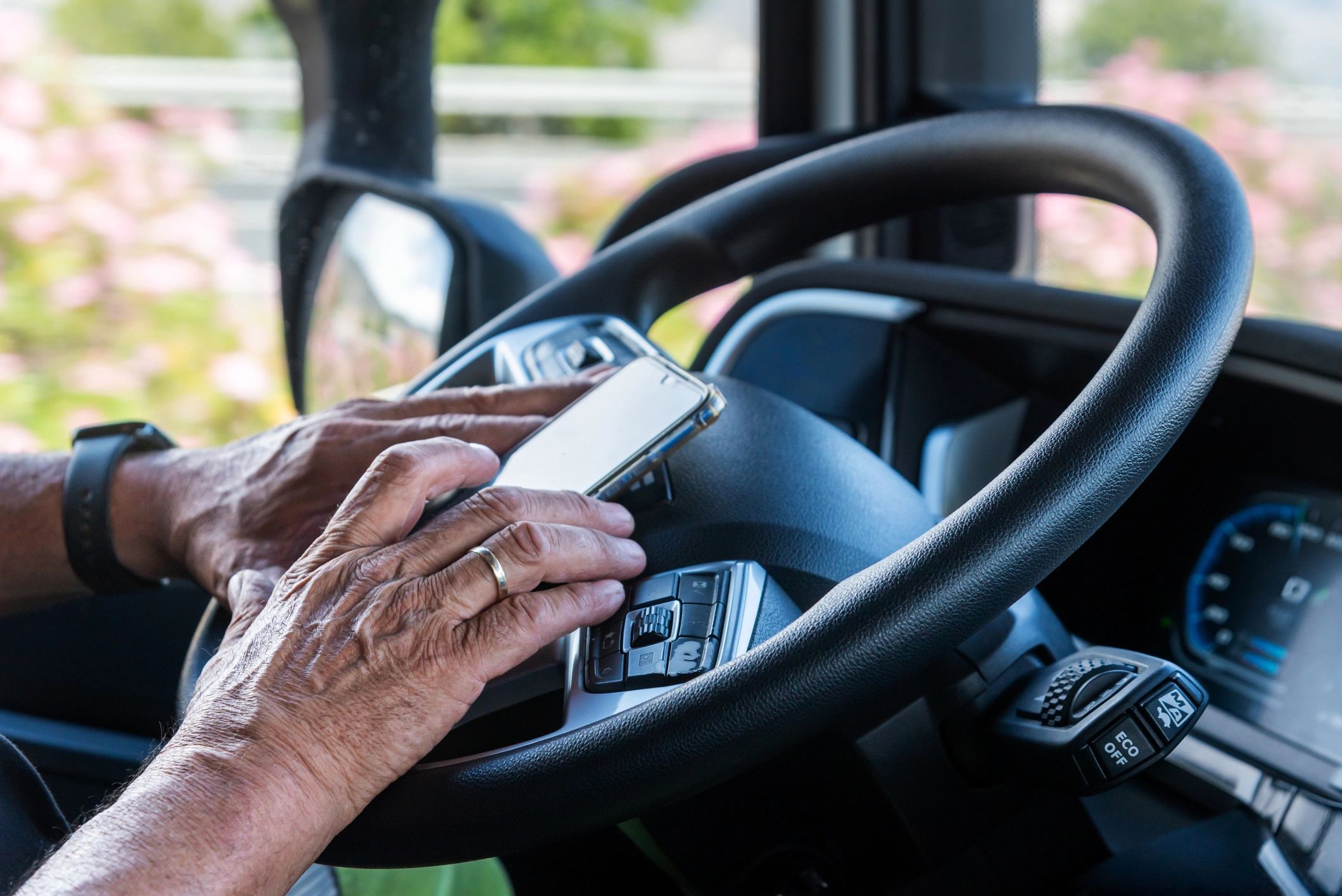 truck driver using smartphone